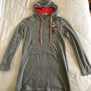 Long tight fit hoodie. Older brand and used but in great shape!